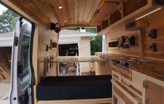 full view of ford transit 350 custom camper van conversion in golden, colorado