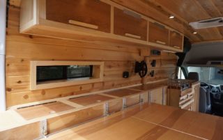 woodwork on ford transit 350 custom camper van conversion in golden, colorado